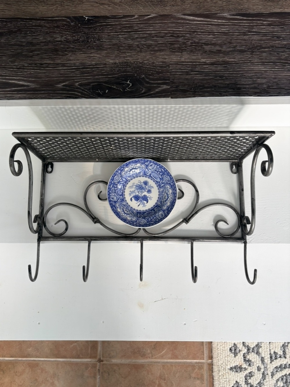Black Wrought Iron Wall Shelf with Hooks and Decorative Blue Plate - Picture 2 of 12